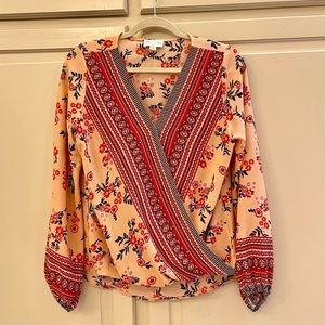 Jun & Ivy peach/coral/navy crossover top. Size large, runs a bit small.